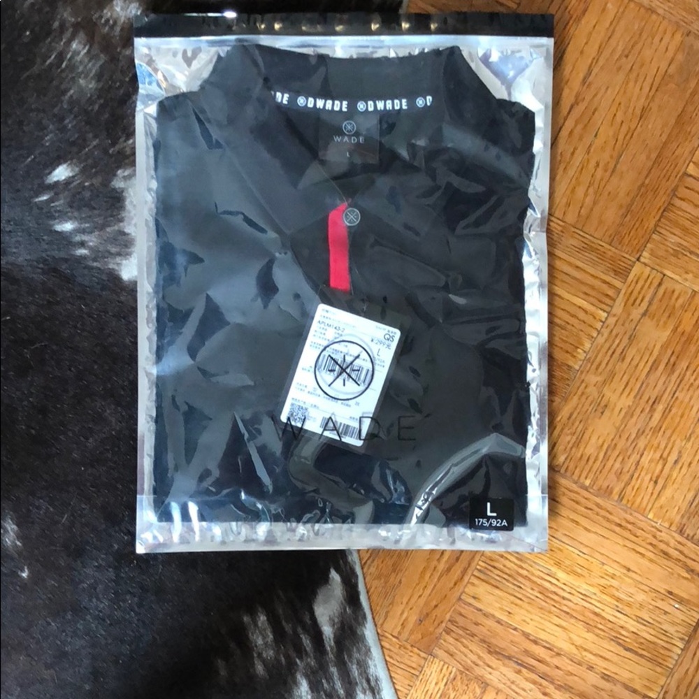 Brand new black polo shirt